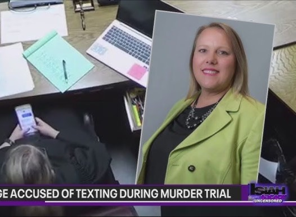 Judge Traci Soderstrom texting in court room. 