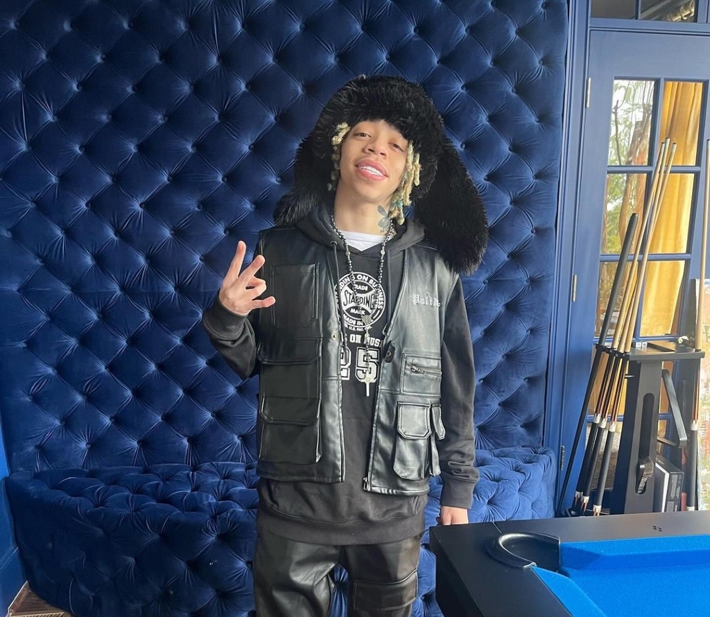 King Harris in his studio posing for a picture. 