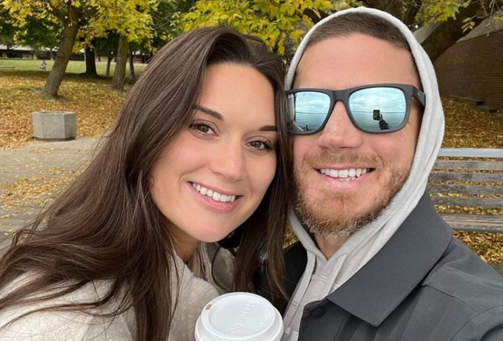 Kyle Carpenter clicking picture with his wife.