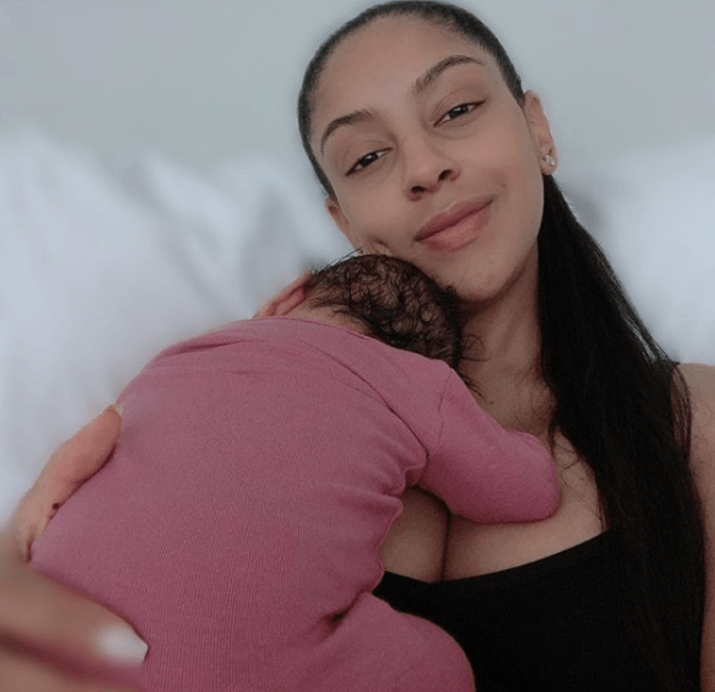 Kyra taking selfie with her baby.